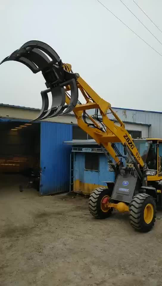 935旋转抓钢机抓草叉抓废轮胎抓机装载机安装抓头工作演示